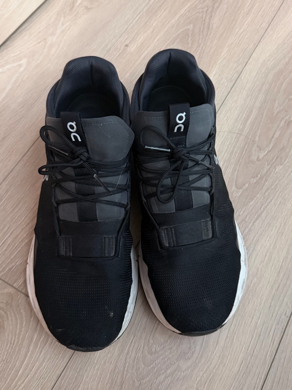 On Running Men's Black Athletic Sneakers with White Soles